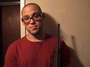 Chris Harper-Mercer holding a rifle in a photo from his MySpace profile. (MySpace/Supplied)
