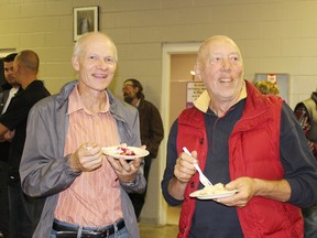 Nick Groot (left) and Don Lazenby enjoy their pie after the agriculture debat at the Embro Community Centre on Oct. 1. The mantra for the night was "policy and pie." (MEGAN STACEY/Sentinel-Review)