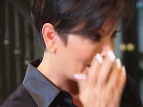 Kris Jenner reacts to seeing Caitlyn Jenner's old clothes. (YouTube)