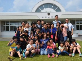 Courtney Wagner poses with her students during her last day of teaching at Sasagawa Elementary School in Shikaoi, Japan - Photo supplied.