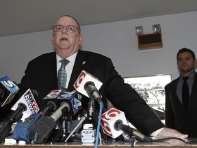 In this Sept. 30, 2015, file photo, Oklahoma Department of Corrections Director Robert Patton gives a statement to reporters in the media centre at the Oklahoma State Penitentiary in McAlester, Okla. Oklahoma's highest criminal court unanimously agreed Friday, Oct. 2, 2015, to halt all of the state's scheduled executions after the state's prison system received the wrong drug for a lethal injection this week. (AP Photo/Sue Ogrocki, File)