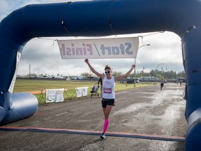 Jennifer Norminton takes first place in the 10 kilometre run, with a time of 39 minutes and 38 seconds, during the Rotary Run for Life in Stony Plain on Sunday, Sept. 13. The run is hosted by the Rotary Club and raises donations for the Coordinated Suicide Prevention Program - Yasmin Mayne.