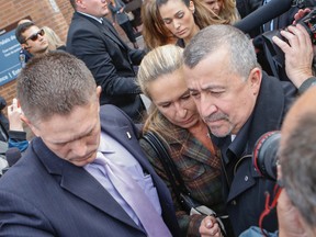 Marco Muzzo's mother, Dawn, leaves Newmarket court on Friday Oct. 2, 2015. (DAVE THOMAS/Toronto Sun)