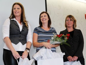 Emily Mountney-Lessard/The Intelligencer
Amey Gentile, centre, was named this year's Remarkable Woman at the Remarkable Women of Quinte event on Friday in Belleville. Lisa Anne Chatten, left, and Melanie Zeith-Morrish, right, were award finalists.