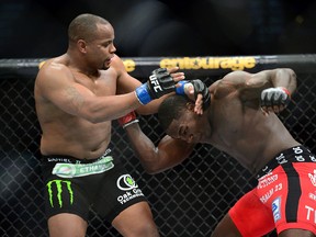 Daniel Cormier (blue gloves) and Anthony Johnson (red gloves) fight during their light-heavyweight championship bout during UFC 187 in Las Vegas on May 23, 2015. Cormier takes on Alexander Gustafsson at UFC 192 in Houston on Oct. 3. (Joe Camporeale/USA TODAY Sports)