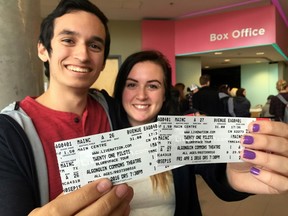 Students Abigael Craig and Ethan Walker picked up tickets for an April show at the Algonquin Commons Theatre by Twenty One Pilots that are in high demand. October 2, 2015. Errol McGihon/Ottawa Sun/Postmedia Network