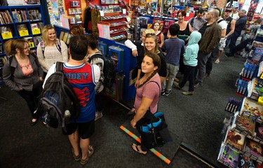 Fans line up to get a Spider-Mable autograph at Happy Harbour Comics, 10729 - 104 Ave., in Edmonton Alta. on Friday Oct. 2, 2015. Organizers hope to raise $5,000 for the Leukemia and Lymphoma Society of Canada. David Bloom/Edmonton Sun/Postmedia Network