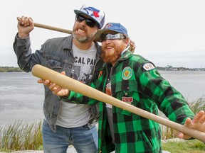 B. Rich (Brendan Richmond) and Steve (Elijah Abrams) pose for a photo by Kingston's Inner Harbour on Friday. The duo's new Toronto Blue Jays-themed video, Home Run Anthem, has gone viral since being released on Wednesday. (Julia McKay/The Whig-Standard)
