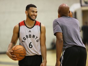 Backup point guard Cory Joseph, seen talking with assistant coach Jerry Stackhouse, should see lots of minutes this season as the Raptors try to not over-work Kyle Lowry. (Kim Stallknecht/Postmedia Network)