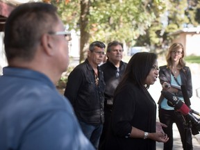 First Nations Summit leader Cheryl Casimer, right, comments on the death of 18-year-old Alex Gervais, who died at an Abbotsford motel while in foster care, after the Youth Matters conference in Vancouver, B.C., on Tuesday, September 29, 2015. Listening behind her are Sto:lo First Nation Grand Chief Doug Kelly, from left, chair of the First Nations Health Council, Scott Clark, Executive Director of the Aboriginal Life In Vancouver Enhancement (ALIVE) society, and Ernie Crey, President of the North West Indigenous Council. THE CANADIAN PRESS/Darryl Dyck
