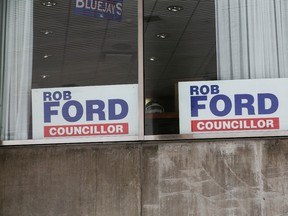 Rob Ford signs displayed in his office windows at Toronto City Hall Friday, October 2, 2015. (Stan Behal/Toronto Sun)