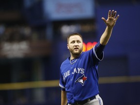 Mark Buehrle of the Toronto Blue Jays gestures to the cheering crowd after being taken out of a game against the Tampa Bay Rays on October 2, 2015 at Tropicana Field in St. Petersburg, Fla. (Brian Blanco/Getty Images/AFP)