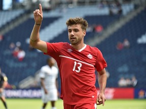 Canada forward Michael Petrasso celebrates after scoring against Panama during the first half at Sporting Park. (Peter G. Aiken/USA TODAY Sports)