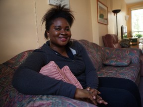 Jeanine Ewet, 27, is a refugee from Cameroon residing at Carty House in Ottawa. She is shown in the house on Wednesday Sept. 30, 2015. 
Errol McGihon/Ottawa Sun