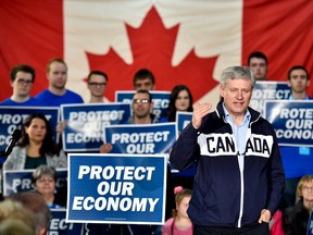 Conservative leader Stephen Harper speaks at a rally during a campaign stop in Bay Robert's, N.L., on Saturday, October 3, 2015. THE CANADIAN PRESS/Nathan Denette