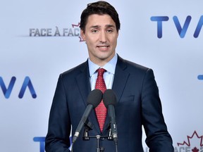 Liberal leader Justin Trudeau speaks to members of the media after taking part in a French-language debate in Montreal on Friday, Oct. 2, 2015. (THE CANADIAN PRESS/Nathan Denette)