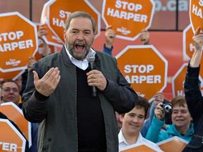 Federal NDP party leader Tom Mulcair speaks to supporters during his visit to Brantford-Brant riding NDP candidate Marc Laferriere's campaign office on Erie Avenue in Brantford, Ontario on Sunday October 4, 2015. Mulcair is making a swing through six ridings in southwestern Ontario where the party feels they can defeat the Conservative candidate. (Brian Thompson/Brantford Expositor/Postmedia Network)