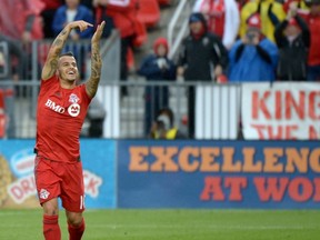 TFC's Sebastian Giovinco celebrates a goal against Philadelphia Union's during first half MLS soccer action Saturday October 3, 2015 in Toronto. THE CANADIAN PRESS/Jon Blacker