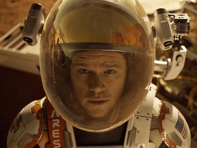 This photo released by 20th Century Fox shows Matt Damon in a scene from the film, "The Martian."  (Aidan Monaghan/20th Century Fox via AP)