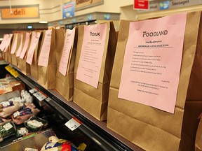 Some of the many donation bags available at Foodland. The new owners have made the bags available all year round instead of one specific holiday. (Shaun Gregory/Huron Expositor)