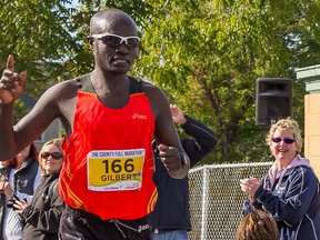 Gilbert Kiptoo of Kenya crosses the finish line of the County Marathon on Sunday October 4, 2015 in Picton, Ont. Tim Miller/Belleville Intelligencer/Postmedia Network