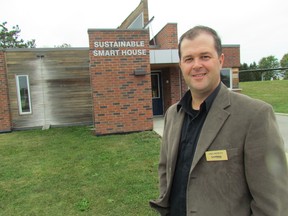 Mike Nesdoly, Lambton College's manager of applied research and innovation, stands outside of the college's Sustainable Smart House on Saturday October 3, 2015 in Sarnia, Ont. Tours of the Smart House were offered Saturday during a Green Energy open house at the college. (Sarnia Observer/Postmedia Network)