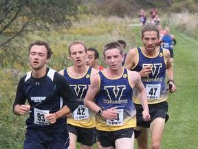 Laurentian men's cross-country running team members Gordie Chown (left), Luke Mackrell, Jacob Dupuis-Latour race at the Don Mills/Waterloo Open on Saturday. The men's team finished fifth overall, while the women's team had a tremendous meet with a top finish.
