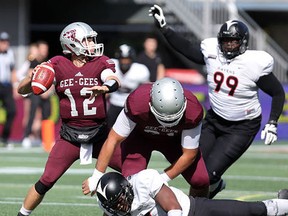 OU QB Derek Wendel of Belleville (12) prepares to throw during Panda Bowl game Saturday in Ottawa. (Postmedia photo)