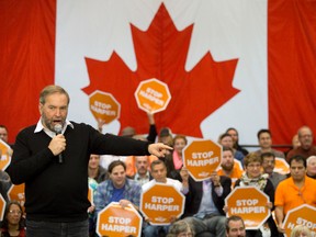 NDP Leader Tom Mulcair has vowed to scrap a proposed Pacific trade deal if it fails to protect dairy and auto jobs here. (CRAIG GLOVER, The London Free Press)