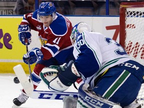 Edmonton's Luke Bertolucci takes a shot on Swift Current goalie Landon Bow (David Bloom, Edmonton Sun).