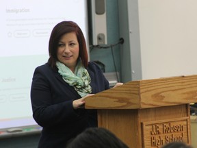 Shannon Stubbs speaks to students at J.R. Robson School.