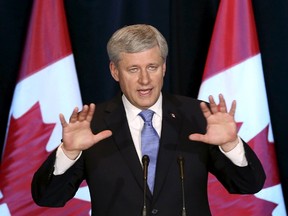 Prime Minister Stephen Harper speaks during a news conference on the Trans-Pacific Partnership (TPP) trade agreement in Ottawa on Oct. 5, 2015. (REUTERS/Chris Wattie)