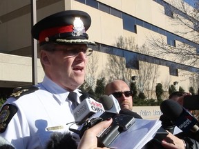 Acting Chief Brian Simpson speaking to reporters outside Edmonton Police Headquarters.