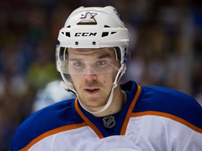 Edmonton Oilers' Connor McDavid skates during the first period of a pre-season NHL hockey game against the Vancouver Canucks in Vancouver, B.C., on Saturday October 3, 2015. THE CANADIAN PRESS/Darryl Dyck