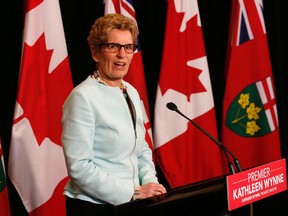 Ontario Premier Kathleen Wynne at a media conference at Queen's Park to speak about her meeting with Prime Minister Harper the night before on Tuesday January 6, 2015. Michael Peake/Postmedia Network