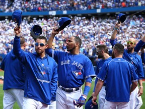 The Toronto Blue Jays salute the fans in the third inning during the final regular season MLB game against the Tampa Bay Rays at the Rogers Centre in Toronto, Ont. on Sunday September 27, 2015. Dave Abel/Toronto Sun/Postmedia Network