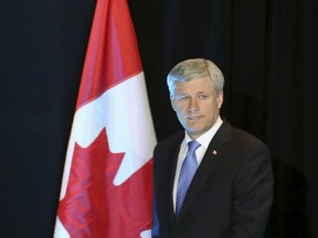 Canada's Prime Minister Stephen Harper arrives at a news conference on the Trans-Pacific Partnership (TPP) trade agreement in Ottawa, Canada October 5, 2015. REUTERS/Chris Wattie