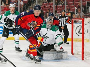 Florida Panthers forward Lawson Crouse looks to tip the puck past Dallas Stars goaltender Jack Campbell during the second period of an NHL preseason game in Sunrise, Fla., on Sept. 22. (Joel Auerbach/The Associated Press)