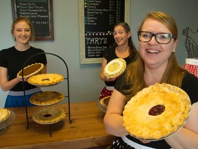 Kelly Gowanlock, right, owner of Littlewood Pie Co. in Lambeth, and staffers Caitlin McKenna and Krista Dafoe show off their best baked goods. (MIKE HENSEN, The London Free Press)