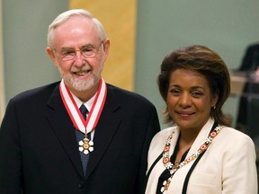 Eminent scientist Arthur McDonald, of Kingston, Ont., is invested as Officer to the Order of Canada by Gov. Gen. Michaelle Jean during a ceremony at Rideau Hall in Ottawa on April 11, 2008. Arthur McDonald, a professor emeritus at Queen's University in Kingston, Ont., and the director of the Sudbury Neutrino Observatory in northern Ontario, is a co-winner of this year's 2015 Nobel Prize for Physics. McDonald, and Japanese scientist Takaaki Kajita, were cited for the discovery of neutrino oscillations and their contributions to experiments showing that neutrinos change identities. (THE CANADIAN PRESS/Fred Chartrand)