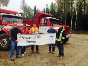 Yves Génier & Sons Ltd were awarded the Board of Trades' Sept Member of the Month. Posing for the photo are (left to right) Raymond Gagné from the Board of Trade, Rémi Génier, Gérald Génier, Richard Duncan and Jean-Yves Génier of Yves Genier & Sons Ltd. Photo submitted
