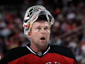 Martin Brodeur of the New Jersey Devils takes a break during the third period against the New York Islanders at the Prudential Center on April 11, 2014. (Bruce Bennett/Getty Images/AFP)