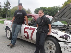 Roper Beaumont, left, and Harlie Hornick were the lead students for the JMSS race car project. The students built the car as part of a high school challenge program offered by Delaware Speedway. The students retired the car on Tuesday and are now getting ready to work on another vehicle for the next racing season.