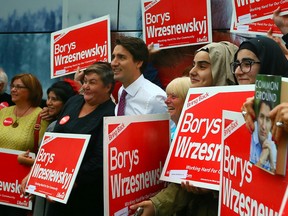 Liberal Leader Justin Trudeau meets with supporters at Stoney's Bread Company in Toronto, Ont. on Monday October 5, 2015. Dave Abel/Toronto Sun/Postmedia Network