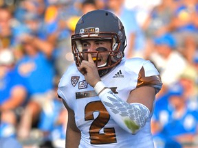 Arizona State quarterback Mike Bercovici gestures to fans after they scored a touchdown during the first half of an NCAA college football game against UCLA on Oct. 3, 2015, in Pasadena, Calif. (AP Photo/Mark J. Terrill)