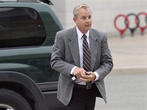 Dennis Oland arrives at the Law Courts in Saint John, N.B. on Wednesday, Sept. 9, 2015. The murder trial of Dennis Oland has resumed for a sixth day in New Brunswick with testimony from a canine officer who searched the area around Richard Oland's office in July 2011. Richard Oland, 69, was found dead in his Saint John office on July 7, 2011. THE CANADIAN PRESS/Andrew Vaughan