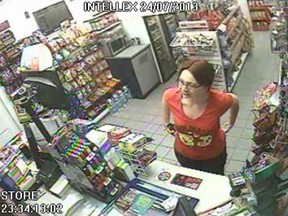 Melissa Richmond, 28, is seen in the final recorded images of her alive as she pays for gas late on July 24, 2013. She would be dead within hours after husband Howard Richmond stabbed her; on trial for first-degree murder he says his PTSD makes him not criminally responsible. (HANDOUT)