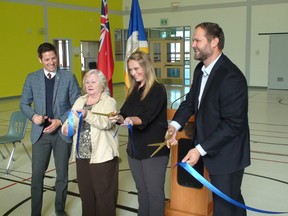 Mayor Brian Bowman, Marlene Amell, Amanda Young and MLA Matt Wiebe at the grand opening of the restored East Elmwood Community Centre, Oct. 6, 2015.