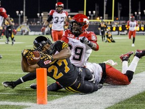 Hamilton Tiger-Cats Michael Ford goes out of bounds in game against the Calgary Stampeders at Tim Hortons Field in Hamilton on Oct. 2, 2015. (REUTERS/Mark Blinch)
