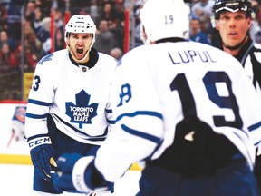 Veteran Leafs forwards Nazem Kadri and Joffrey Lupul celebrate a goal. (Reuters file)